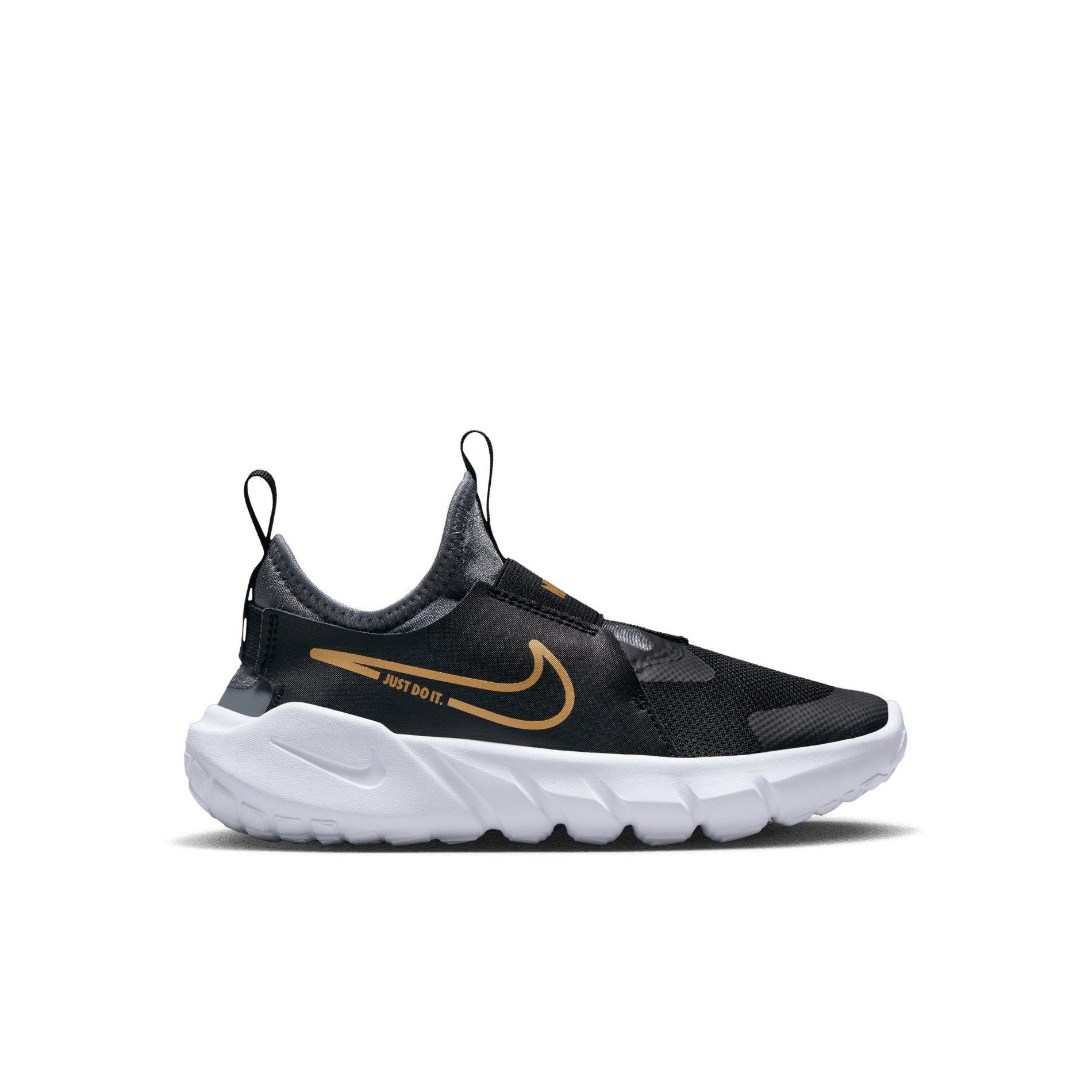 Black and gold nikes hot sale boys